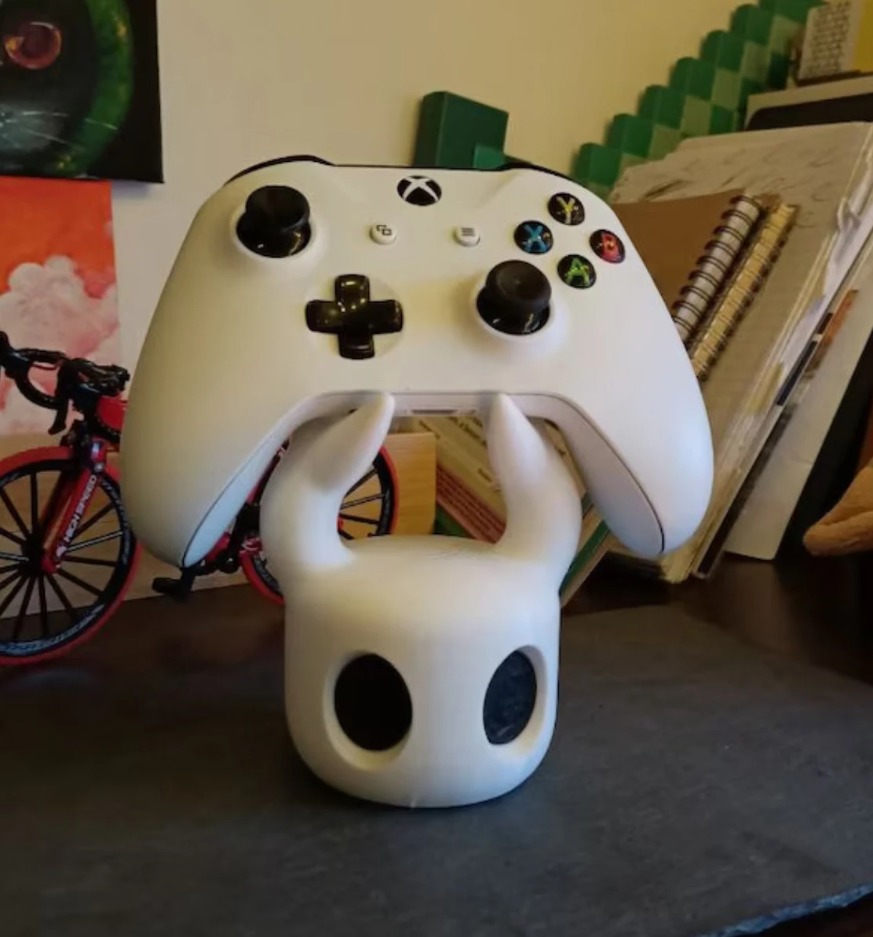 حامل تحكم ألعاب بتصميم شبح كرت - مراجعة Gaming Consoles وسعره